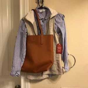 Cream/oatmeal vest with pockets and faux fur